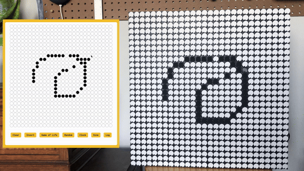 A gif of a flip dot display flipping individual disks between black and white.